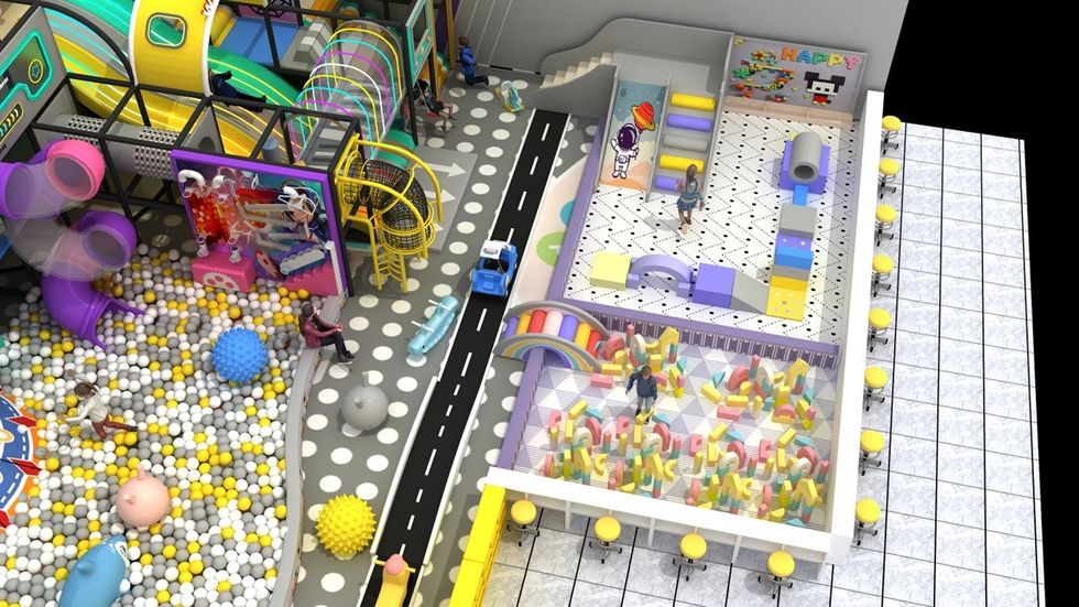 Colorful indoor playground with slides, ball pit, and play structures.