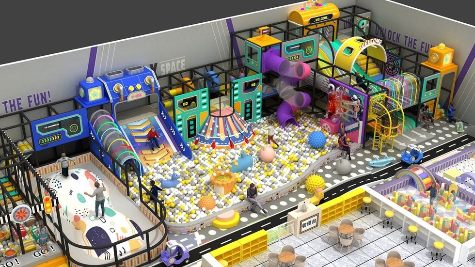 Colorful indoor playground with slides, ball pit, tubes, and activity areas.