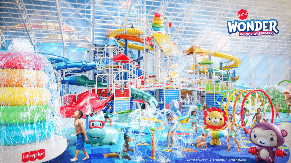 Colorful indoor waterpark with slides and splashing fountains, kids playing joyfully.