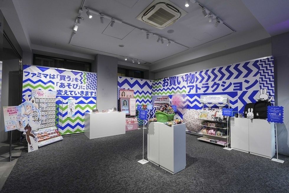 Colorful Japanese store display with merchandise and bold zigzag patterns on the walls.