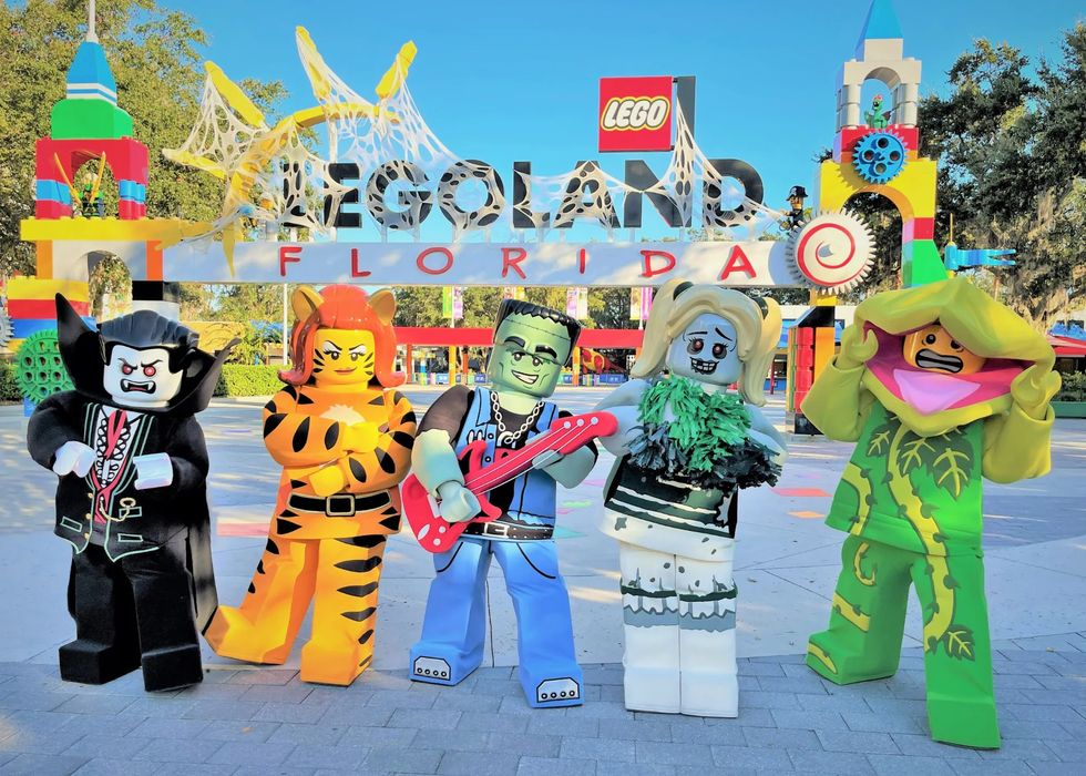 Colorful LEGO monster mascots at LEGOLAND Florida entrance.