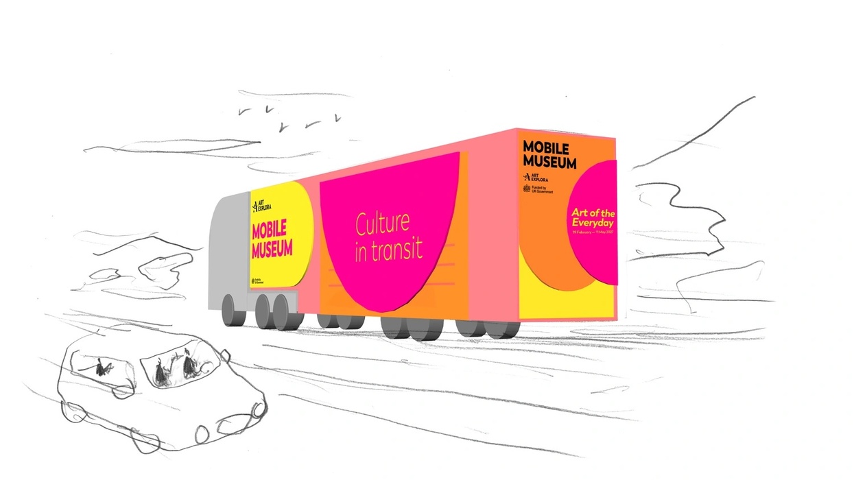 Colorful "Mobile Museum" truck with "Culture in Transit" logo, driving beside a car.