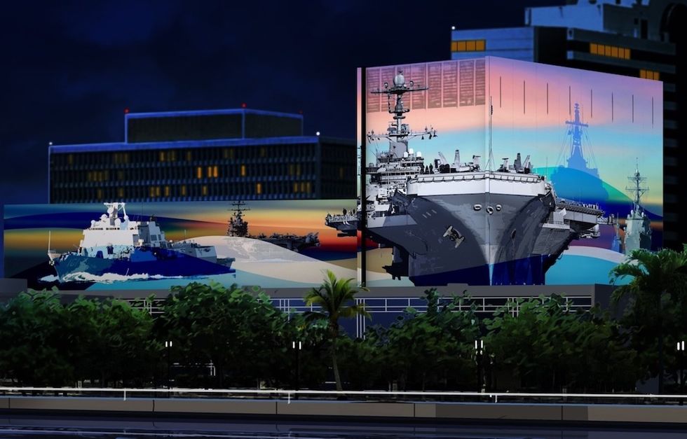 Colorful mural of battleships displayed on a building at night, Jacksonville at Night Experience