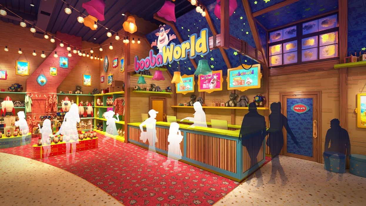 Colorful toy store interior with "boobaWorld" sign, bright decor, and customers browsing.