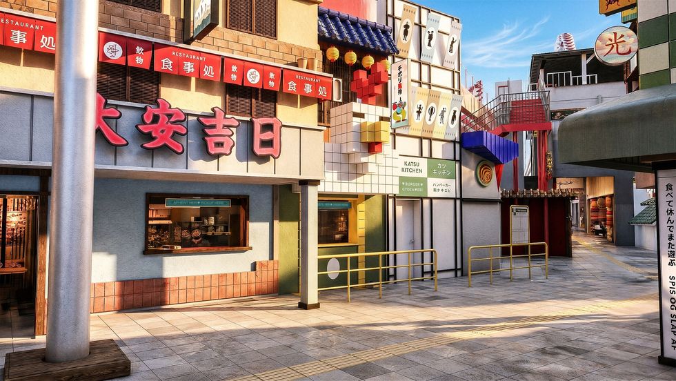 Colorful urban street with Japanese restaurant signs and vibrant building facades at Tivoli Gardens