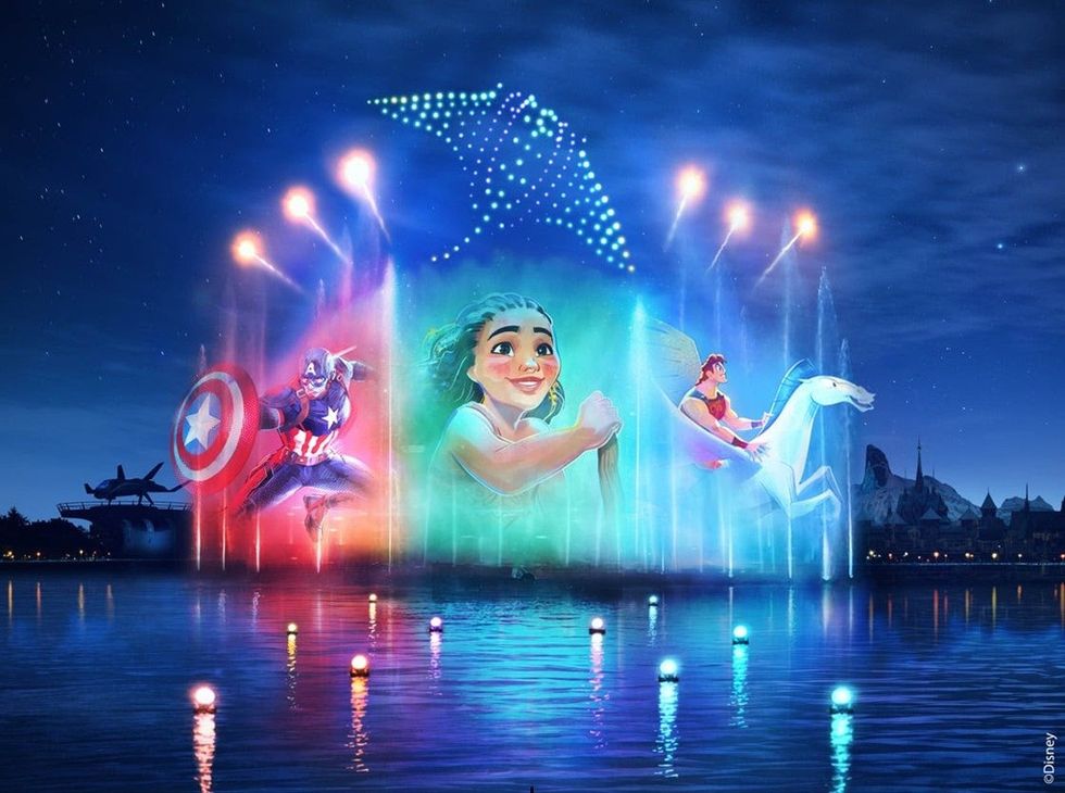 Colorful water show with animated characters projected onto fountains under a night sky.