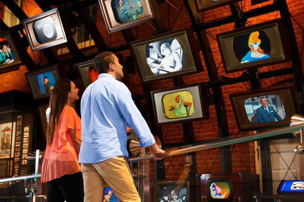 Couple watching Disney animation videos at the Walt Disney Family Museum