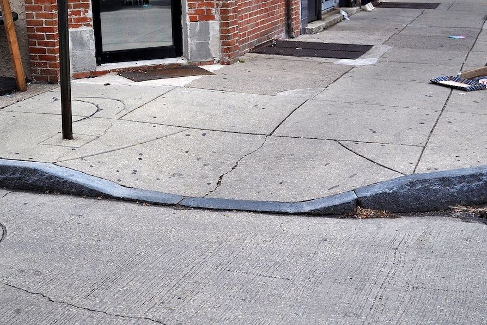 Curb_cut_for_wheelchair_ramp museum accessibilty
