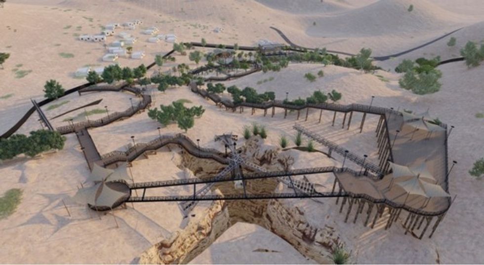 Desert bridge and pathways winding through rocky terrain with scattered greenery.