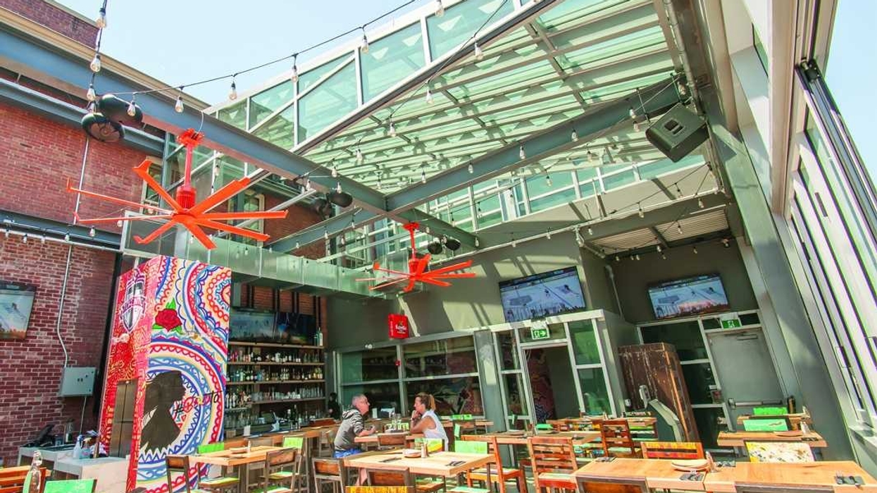 diners in all-weather retractable enclosure at Barcelona Tavern, Toronto