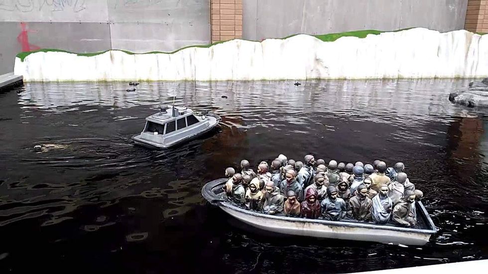 Dismaland boat of migrants weston super mare banksy