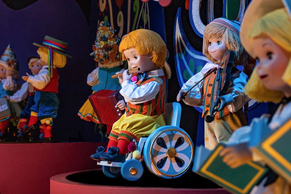 disney world doll in a wheelchair