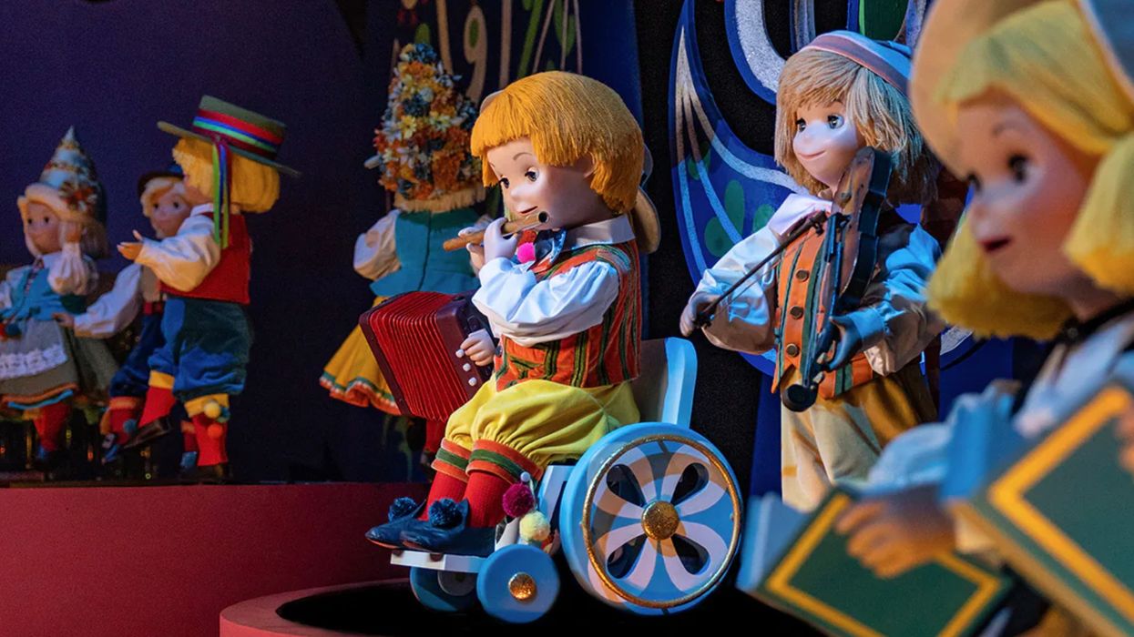 disney world doll in a wheelchair