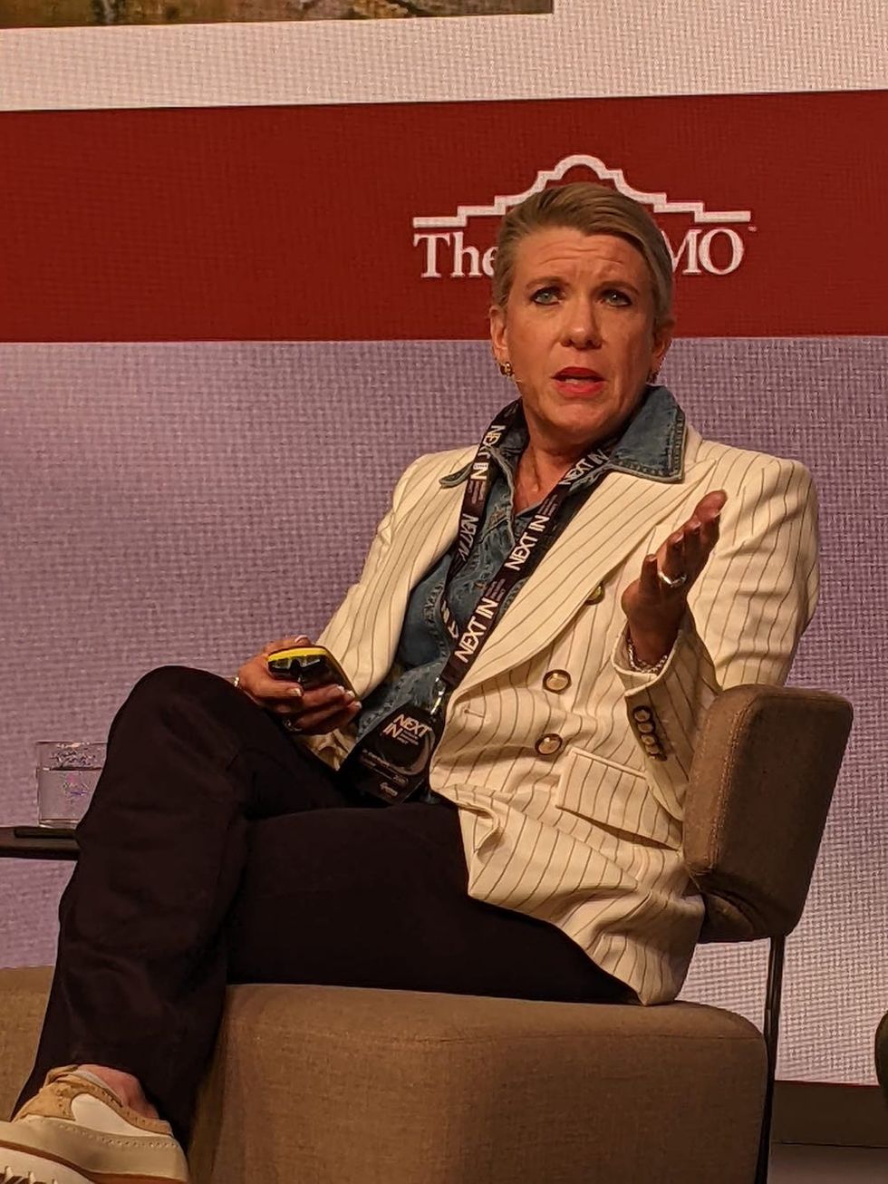 dr kate rogers director el alamo in a chair speaking at a conference