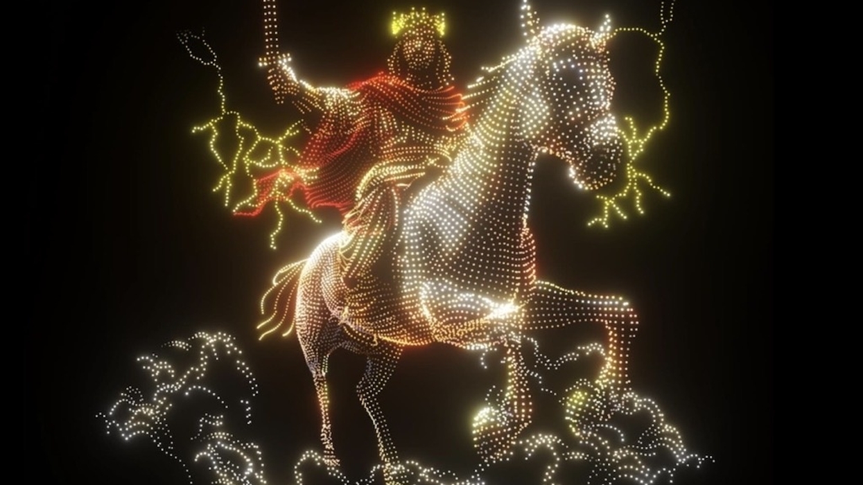 Drone show of a glowing Jesus on a horse with a sword, surrounded by lightning-like energy.