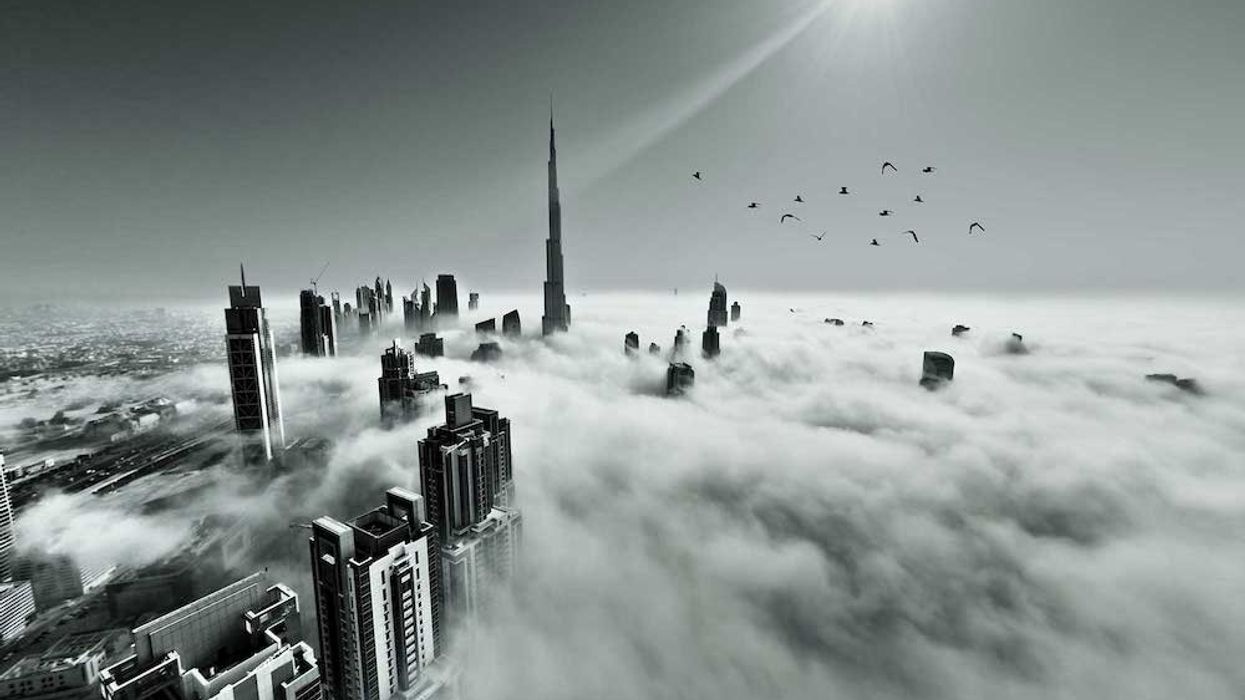 dubai skyscrapers through the clouds