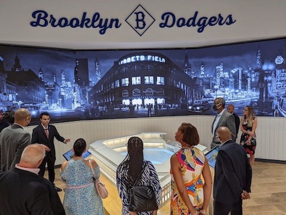 Ebbets Field tour guide with group