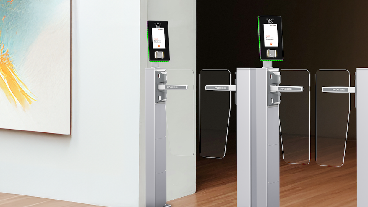 Electronic security turnstiles with card readers and digital screens.