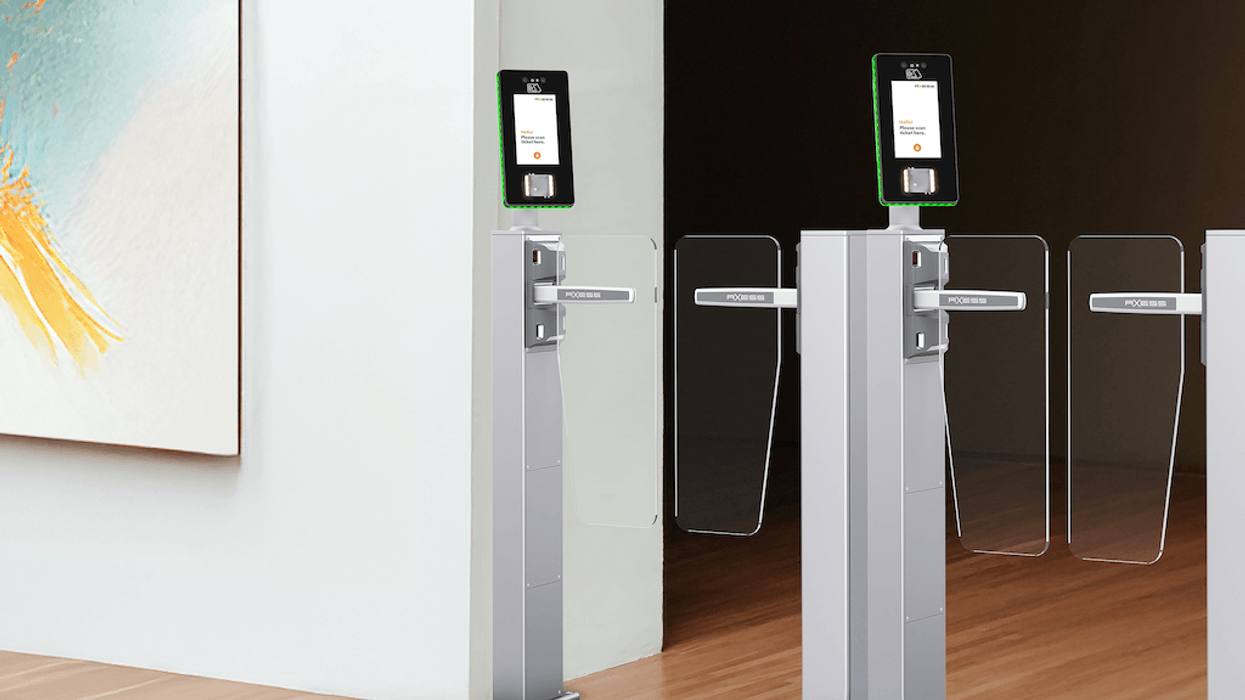 Electronic security turnstiles with card readers and digital screens.