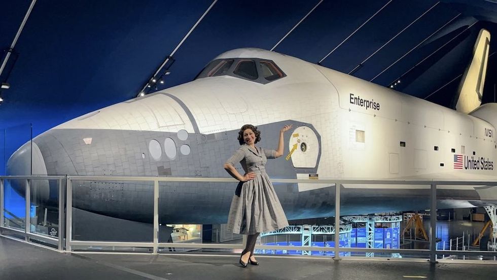 Elysia Segal as Betty Skelton at the Intrepid Museum immersive theatre in LBE