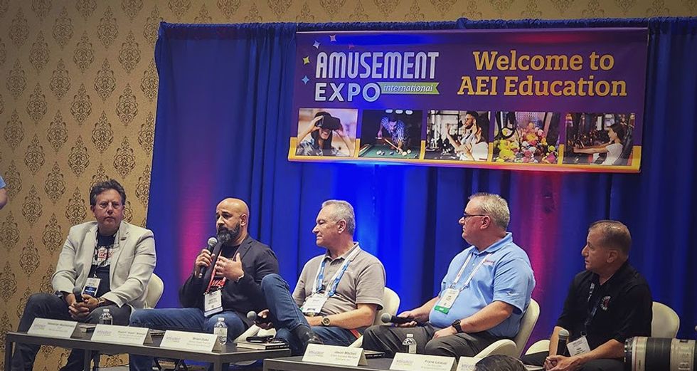 Embed's Kash Ahmed speaks during AEI 2023