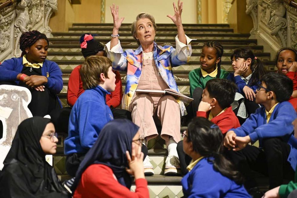 Emma Thompson reads to pupils from east London-based Globe Primary School. Globe Primary School is one of several local schools who have been involved in creating Young V&A. © Photograph James Watkins - Puffin