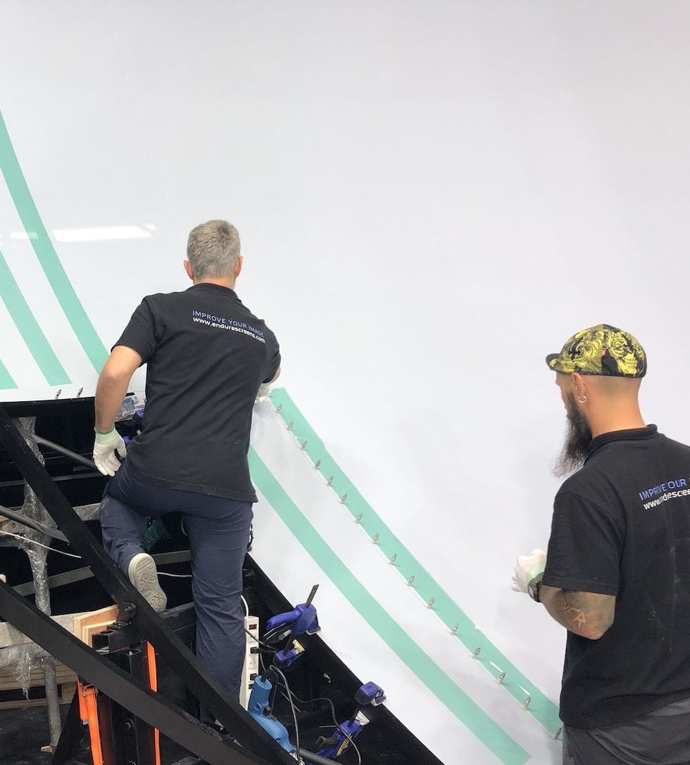 Endurescreens team installing at Odyssey Malta