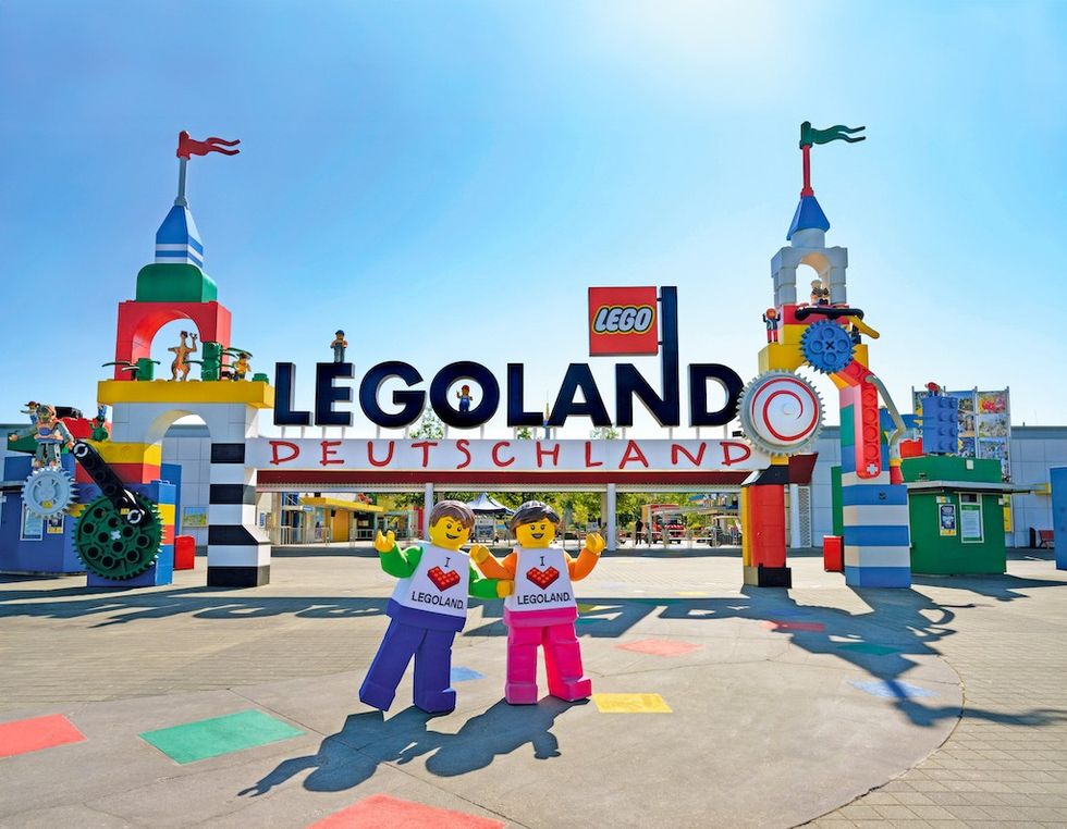 Entrance of Legoland Deutschland with colorful Lego structures and figures.