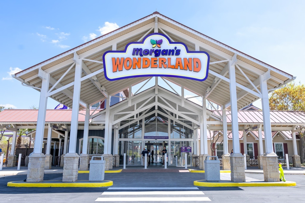 Entrance to Morgan's Wonderland theme park with a welcoming sign and pathway.
