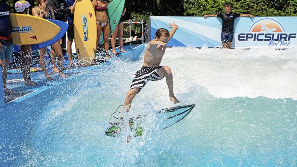 EpicSurf Heroes Paradise child surfing