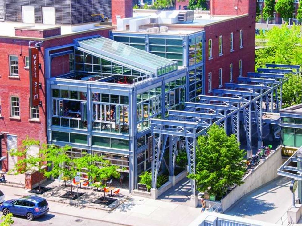 exterior of Barcelona Tavern, Toronto with openaire retractable glass enclosure