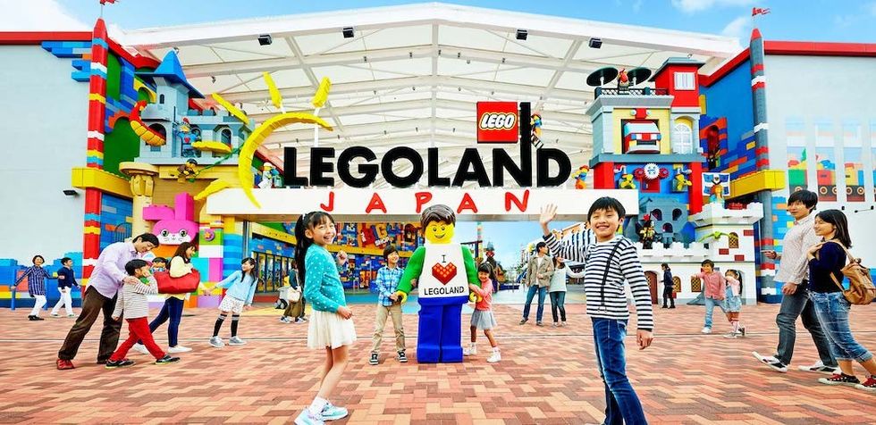 Families and kids enjoy the colorful entrance of Legoland Japan.