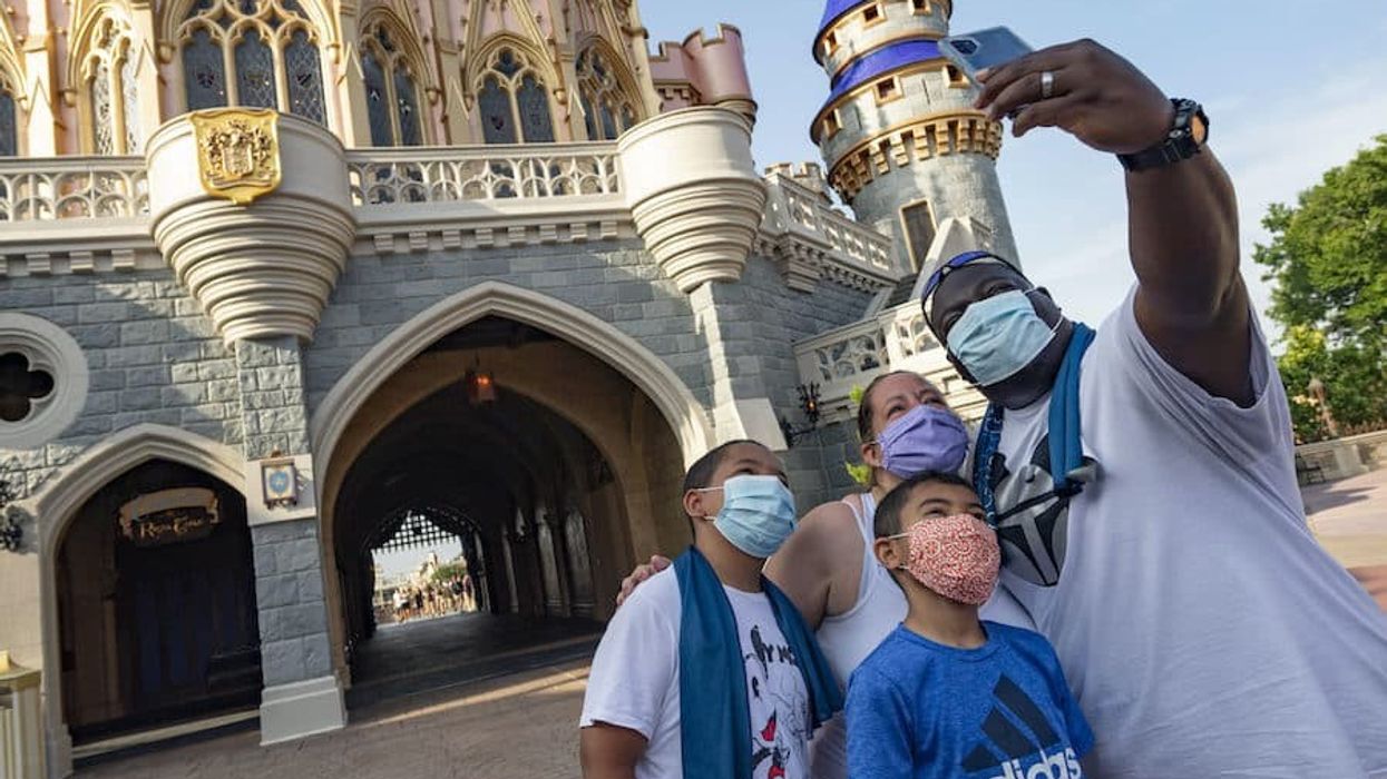 Family at Disney World masks