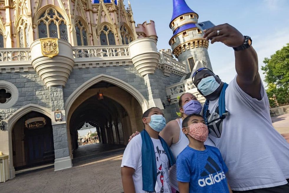Family at Disney World masks