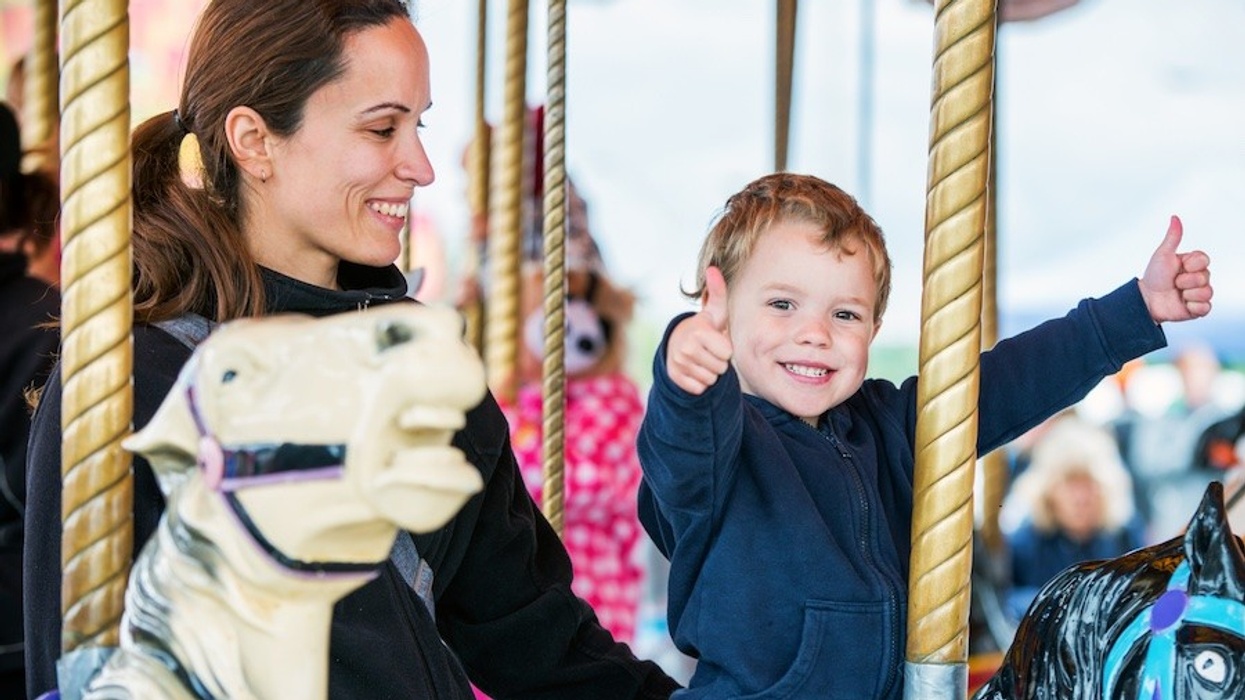 family on carousel