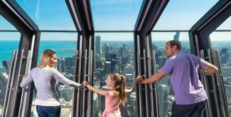 Family on TILT thrill ride at 360 CHICAGO Observation Deck