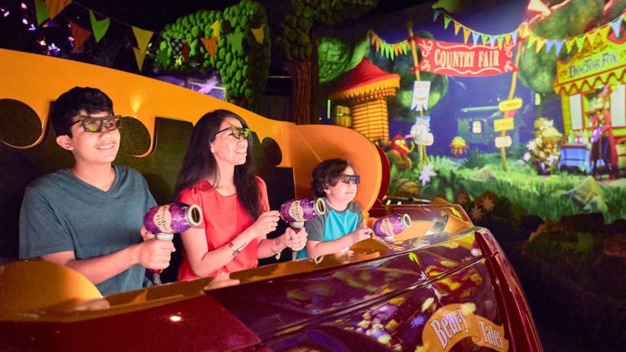 Family riding Knott's Bear-y Tales