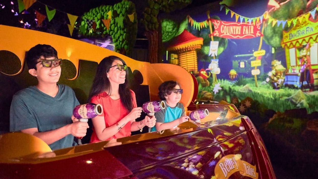 Family riding Knott's Bear-y Tales