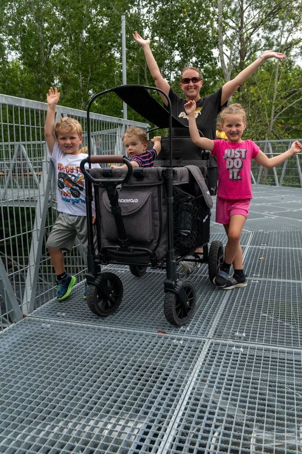 family with a buggy exploring The Nautilus Observation Tower