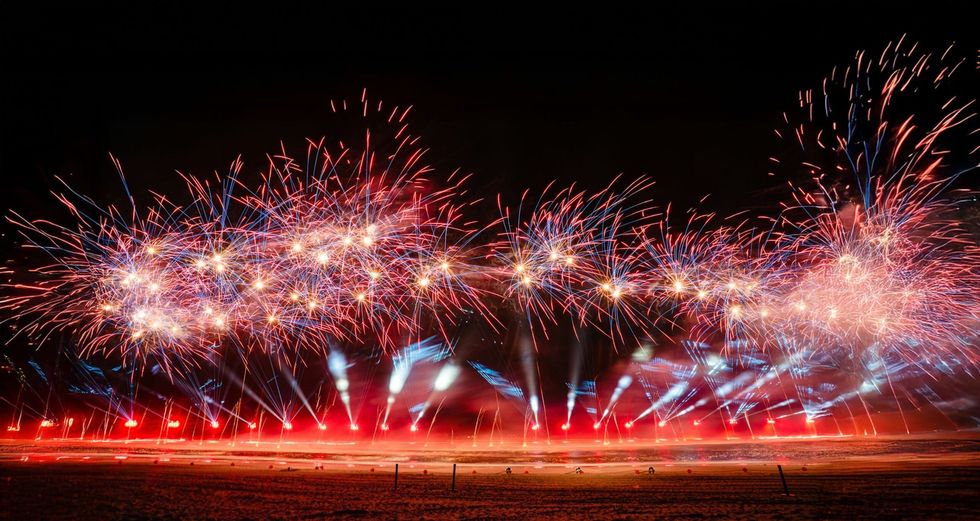 Fireworks over the beach at Symphony of the Green Island, C\u00e1t B\u00e0 Island