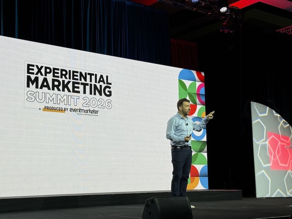 Florent Bayle-Labour\u00e9 of Cirque du Soleil presenting at Experiential Marketing Summit 2026, colorful patterns in background.