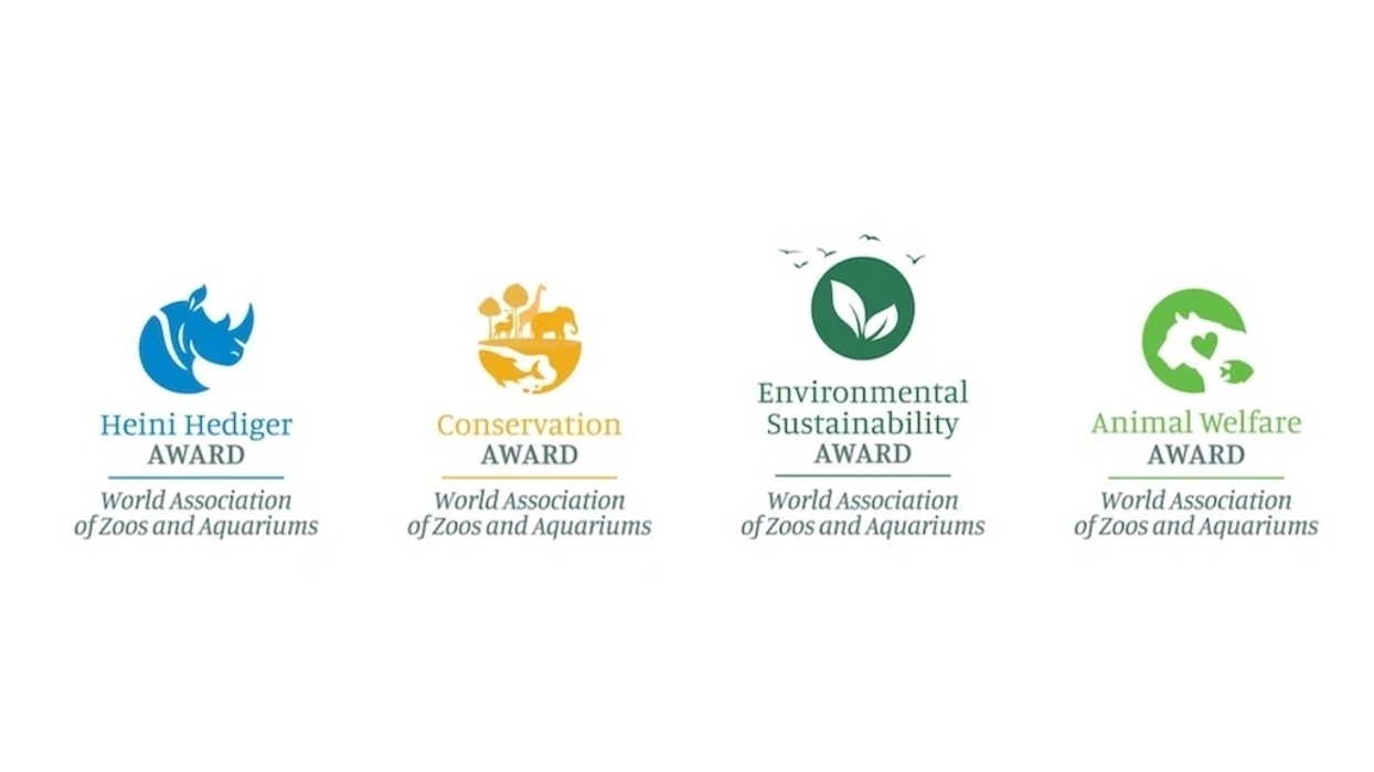 Four award logos from the World Association of Zoos and Aquariums.