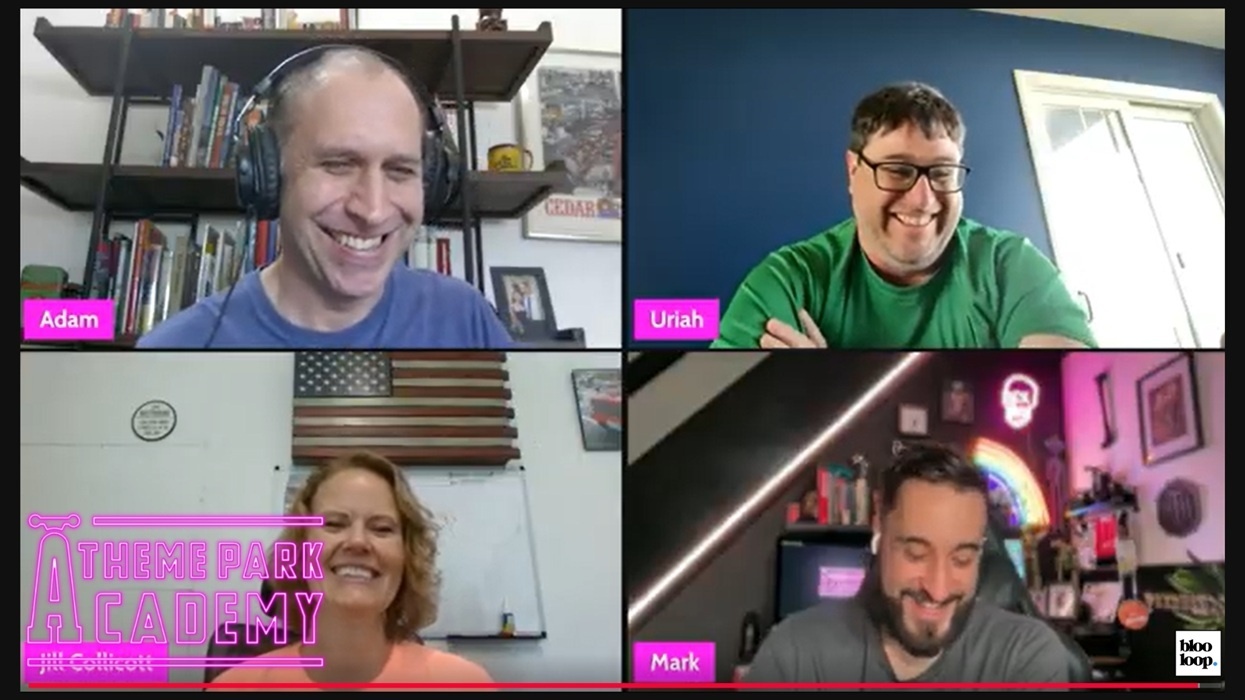 Four people in a virtual meeting, smiling and speaking in different video call frames.