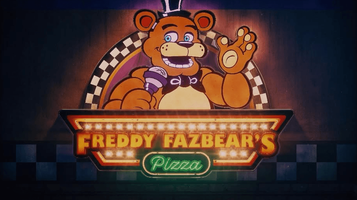 Freddy Fazbear's Pizza sign with cartoon bear and microphone.