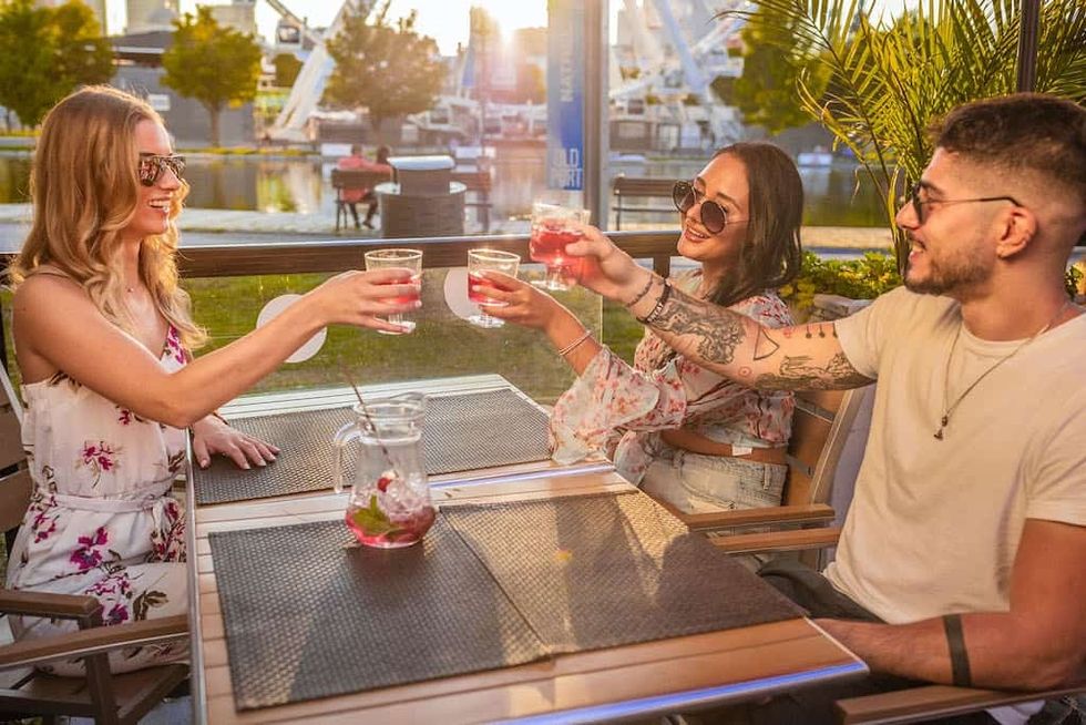 Friends drinking at Old Port Montreal