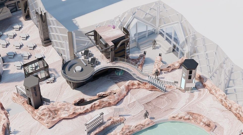 Futuristic architectural model with walkways, structures, and a pool, surrounded by rocky terrain.