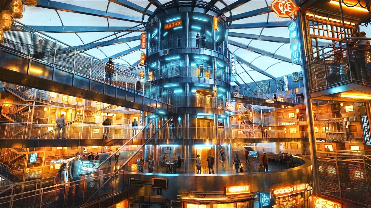 Futuristic hotel at Futuroscope with neon signs and multiple levels bustling with people.