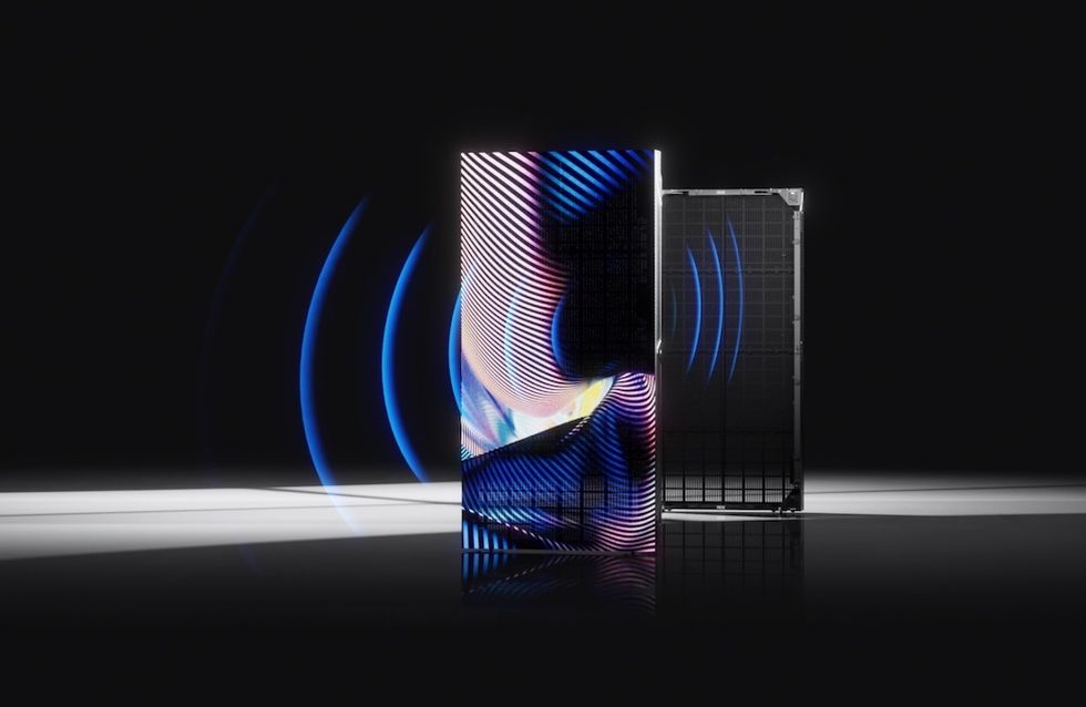 Futuristic server, Vanish Acoustics LED panel, with glowing blue arcs and digital wave patterns on a dark background.