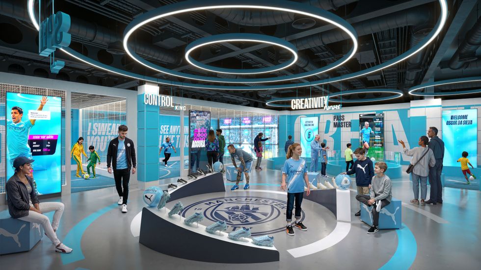 Futuristic sports exhibit with interactive displays and Manchester City branding at the Manchester City Museum Experience