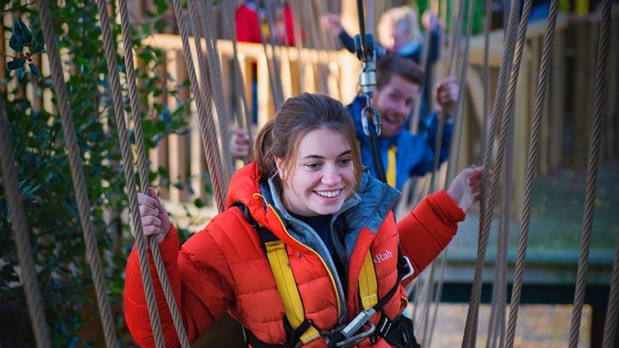 girl enjoys kanopeo aerial adventure ACCT conference